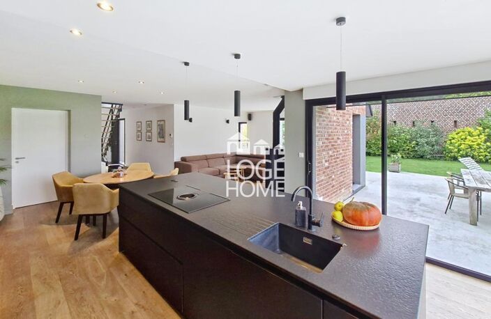 MAISON INDIVIDUELLE EN BRIQUES DE 2020 AVEC UN ESPACE DE VIE DE 56 M², JARDIN, GARAGES DEUX VOITURES — photo 4