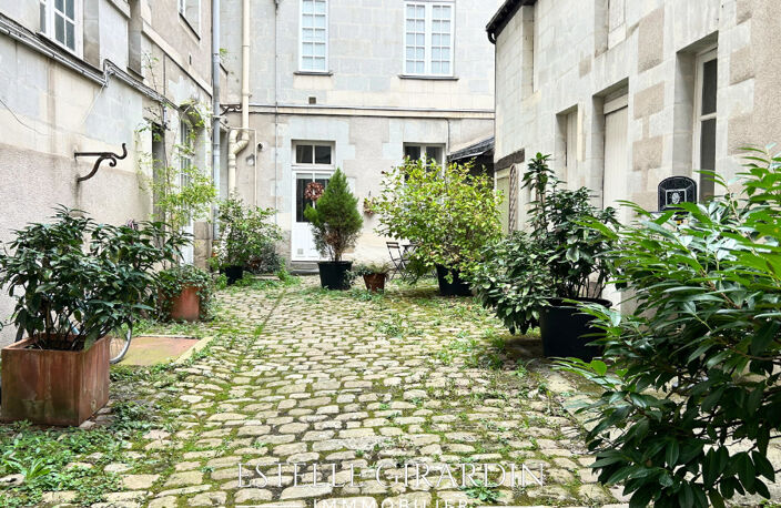 Nantes centre - Appartement de caractère de 97 m² avec garage et cave voûtée — photo 5
