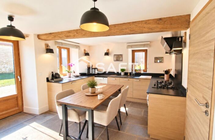 Coup de coeur pour cette magnifique longère de 1850 entièrement rénovée avec goût sur 143 m2, T4 avec 3 chambres, jardin de 664m2 orienté plein sud, préau de 36 m2 et grange aménageable de 50m2 — photo 4