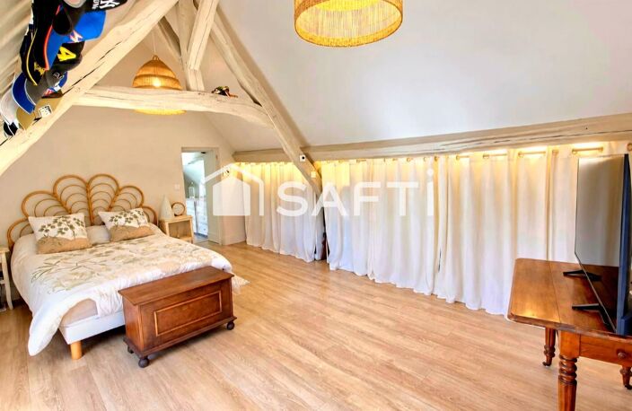 Coup de coeur pour cette magnifique longère de 1850 entièrement rénovée avec goût sur 143 m2, T4 avec 3 chambres, jardin de 664m2 orienté plein sud, préau de 36 m2 et grange aménageable de 50m2 — photo 5