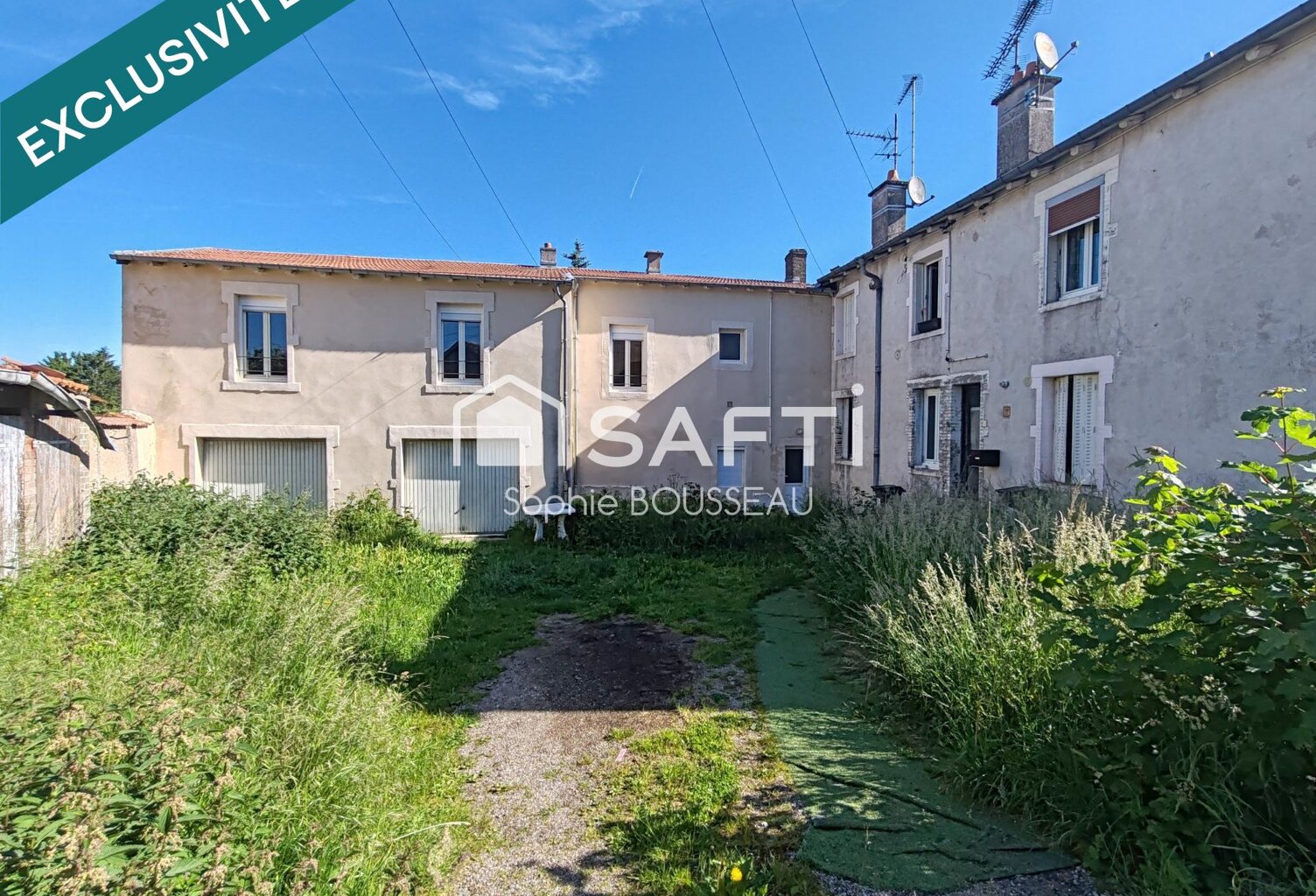 Maison avec garages et jardin — photo 1