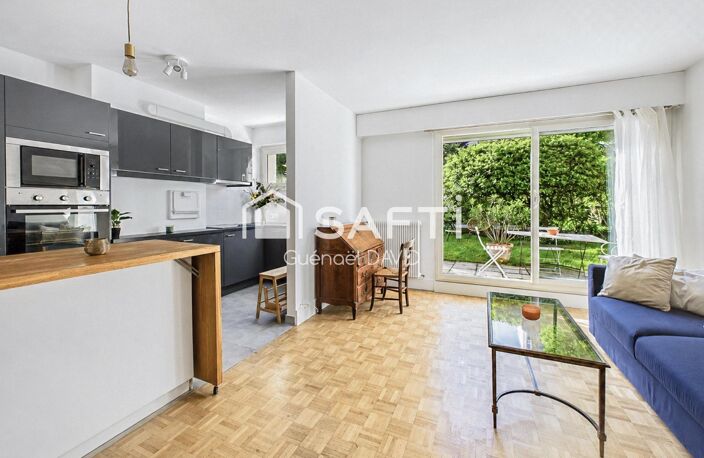 RARE : APPARTEMENT, JARDIN, CAVE ET PARKING — photo 2