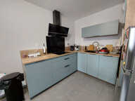 Appartement T2, terrasse, cave et parking - ONET-LE-CHATEAU — photo 4