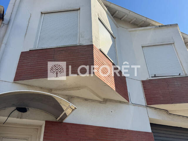 Maison de ville 90 m² avec garage et terrasse — photo du bien