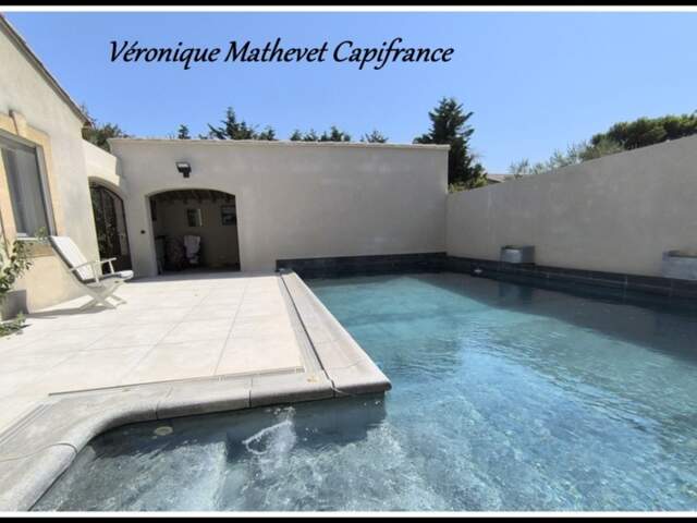 MAISON PLAIN PIED AVEC PISCINE ET SANS VIS A VIS — photo du bien