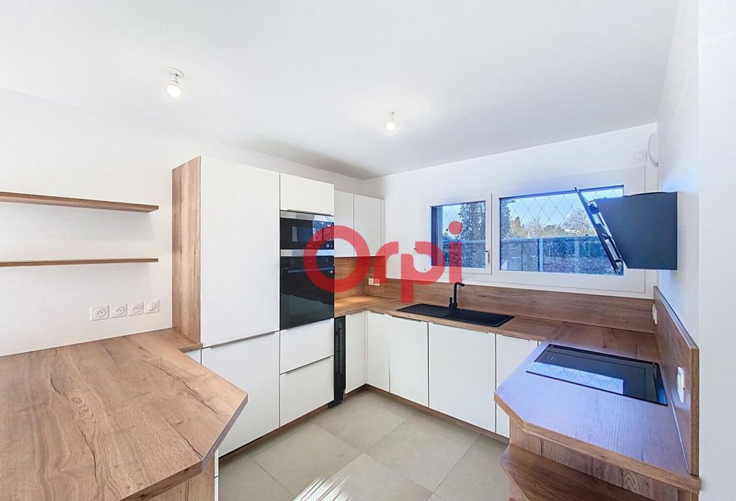 Appartement avec terrasse, jardin, cave et un stationnement en sous-sol — photo 1