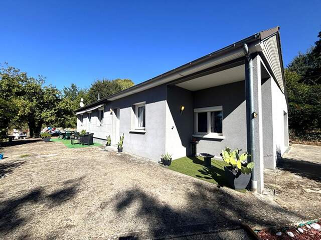 Maison de plain-pied de 90 m²  3 chambres  terrain de 4 715 m² avec verger — photo du bien