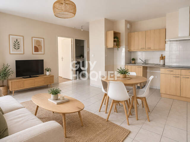 Grand T2 avec balcon dans un bel immeuble récent — photo du bien