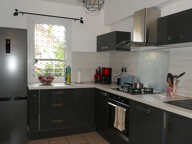 DUINGT. APPARTEMENT DUPLEX AVEC JARDIN ET GARAGE — photo 3