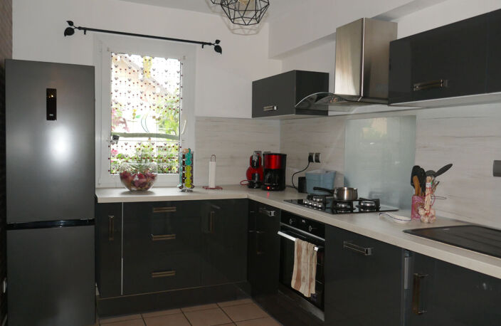 DUINGT. APPARTEMENT DUPLEX AVEC JARDIN ET GARAGE — photo 3
