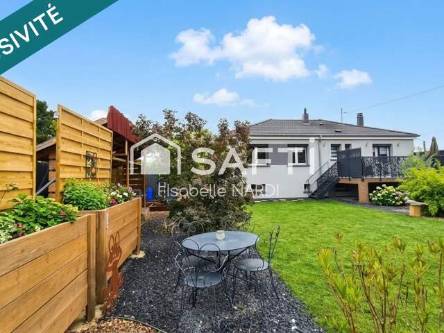 Laissez-vous séduire par les beaux volumes et les finitions irréprochables de cette maison individuelle de plain-pied surélevé ! — photo du bien