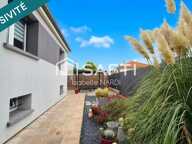 Laissez-vous séduire par les beaux volumes et les finitions irréprochables de cette maison individuelle de plain-pied surélevé ! — photo 3
