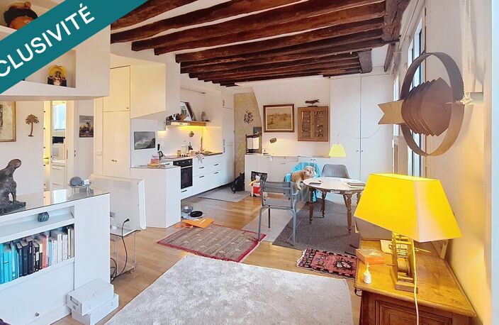 PARIS 19E  Appartement de 40,8 m² rénové par architecte  Vue sur les Buttes-Chaumont — photo 4