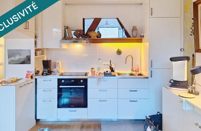 PARIS 19E  Appartement de 40,8 m² rénové par architecte  Vue sur les Buttes-Chaumont — photo 5