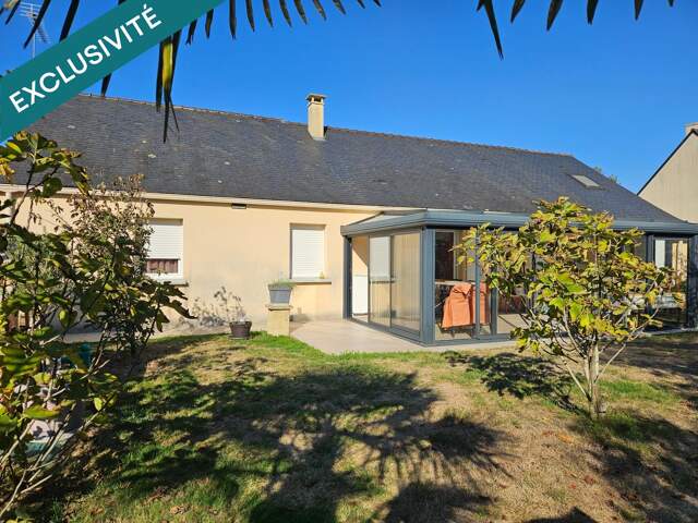 Maison familiale de 103 m² avec véranda chauffée et garage — photo du bien