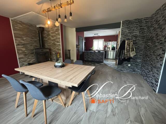 Une maison aux multiples possibilités, idéale pour une famille en quête d'espace et de sérénité ! — photo du bien