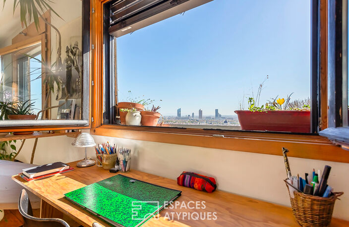 Un appartement avec vue sur les toits de Lyon — photo 5