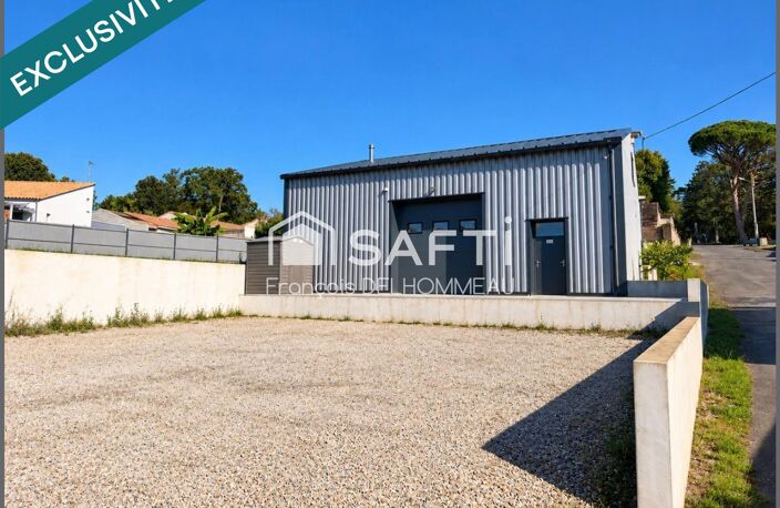 ATELIER PROFESSIONNEL DE 130 M² AVEC MEZZANINE ET BUREAU — photo 2