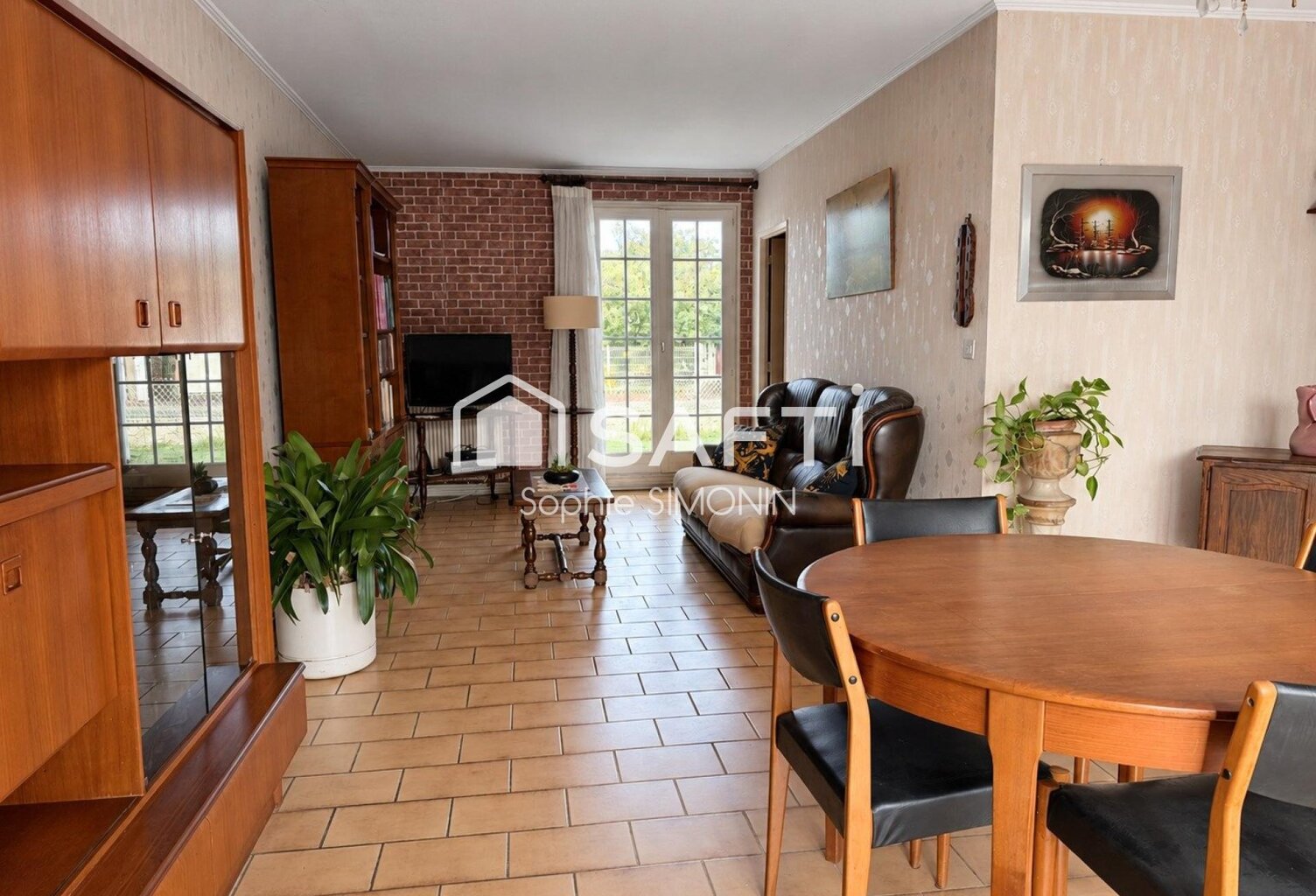 Maison de plain pied avec jardin arboré — photo 1