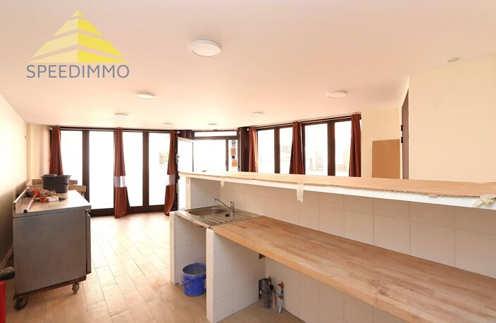 IMMEUBLE DE RAPPORT – COMMERCE + 3 APPARTEMENTS — photo 2