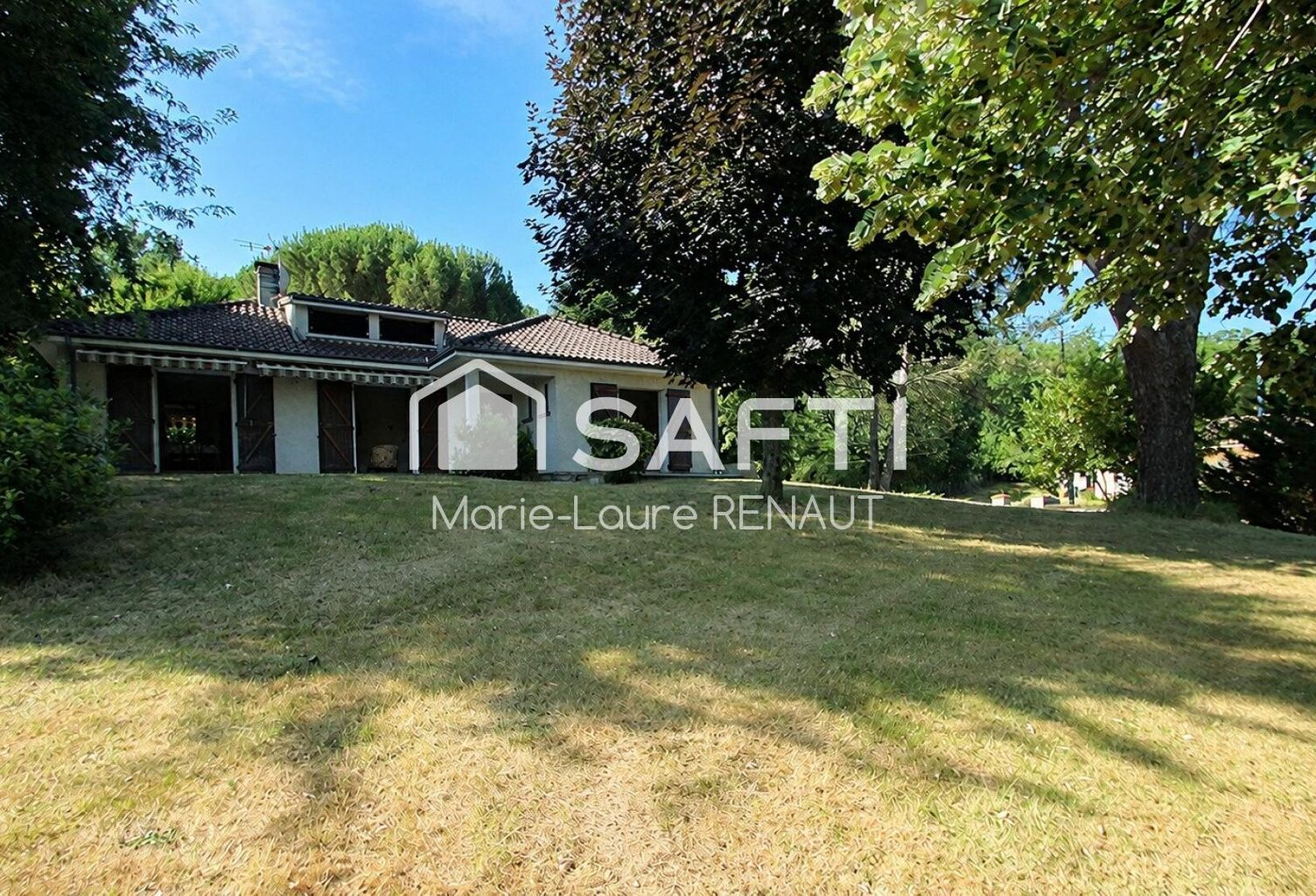 Maison familiale avec parc arboré et grand sous-sol — photo 1