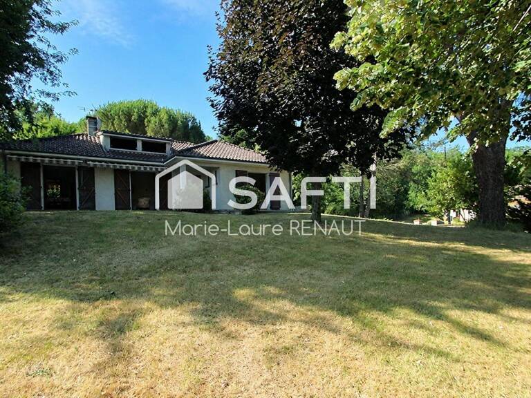 Maison familiale avec parc arboré et grand sous-sol — photo 1