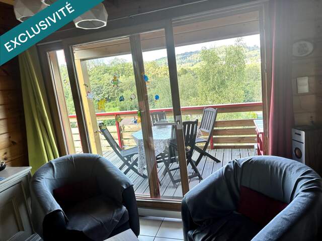 Charmant chalet avec vue dégagée et belle exposition à Saint Nabord les Breuchottes. — photo du bien