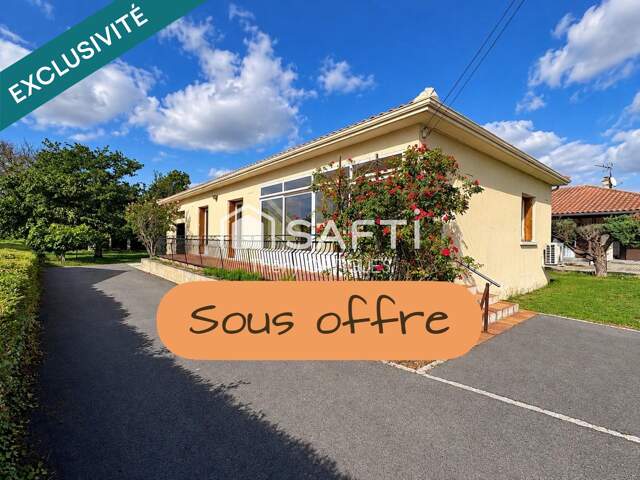Maison de 90 m² avec grand terrain arboré de 1 195 m² et garage de 34 m² — photo du bien