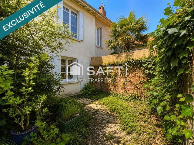 Maison à Saint-Genès - garage + jardin — photo du bien