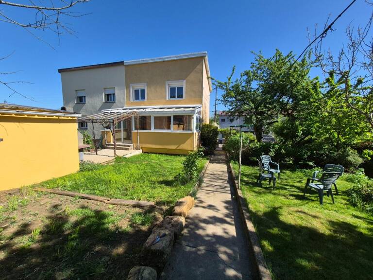 Maison jumelée 5 pièces avec double garage, véranda et jardin plein sud — photo 1