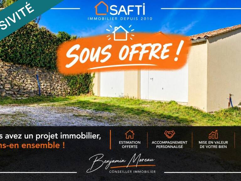 Double garage offrant un bel espace pour atelier ou stockage — photo 1