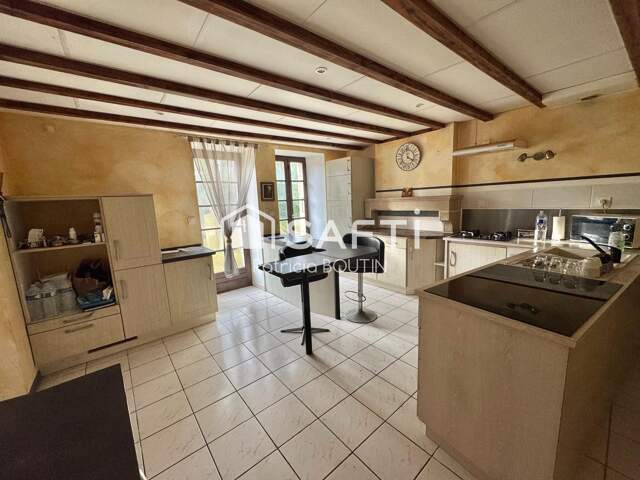 MAISON EN PIERRE 3 CHAMBRES + UN BUREAU ET GARAGE A COULONGES SUR L'AUTIZE ! — photo du bien