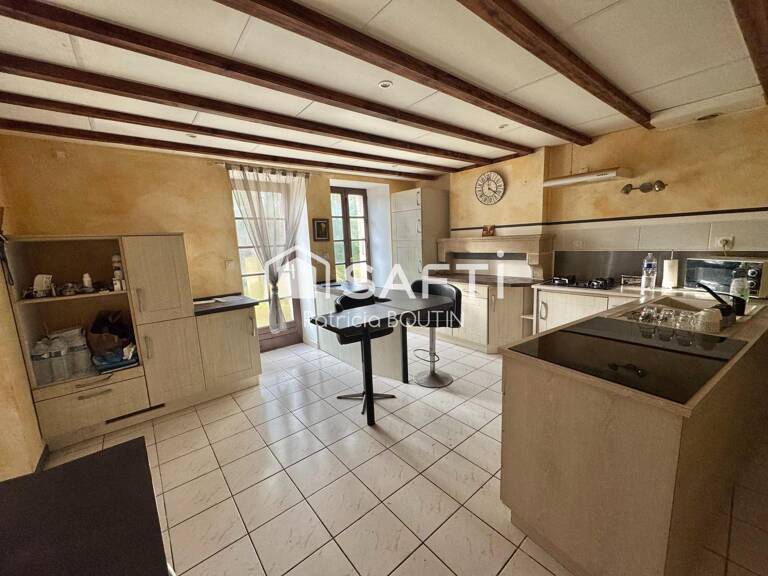 MAISON EN PIERRE 3 CHAMBRES + UN BUREAU ET GARAGE A COULONGES SUR L'AUTIZE ! — photo 1