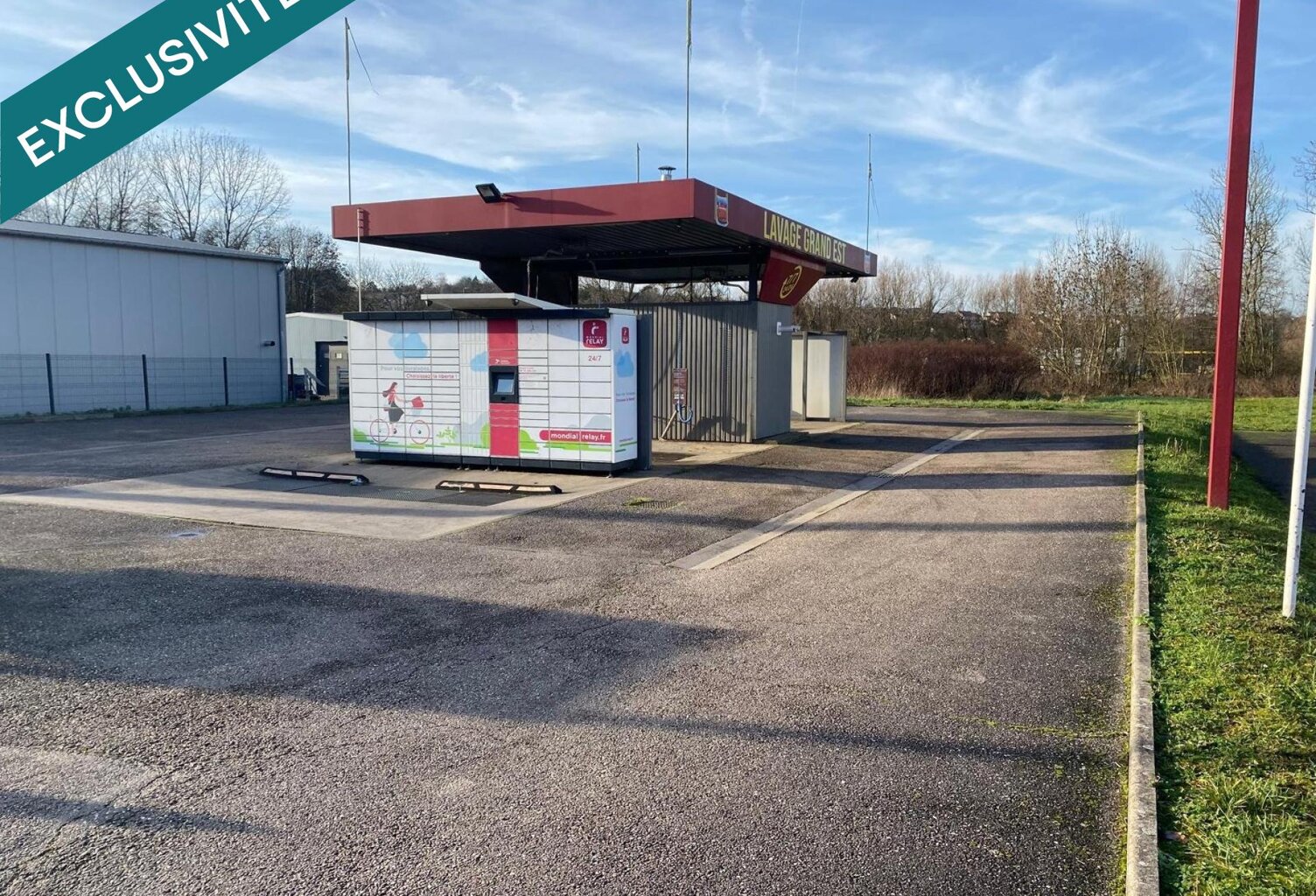 terrain industriel d'une surface de 2274 m2 sur lequel est pose une station de lavage , environ 1000 m2 est utilisé — photo 1