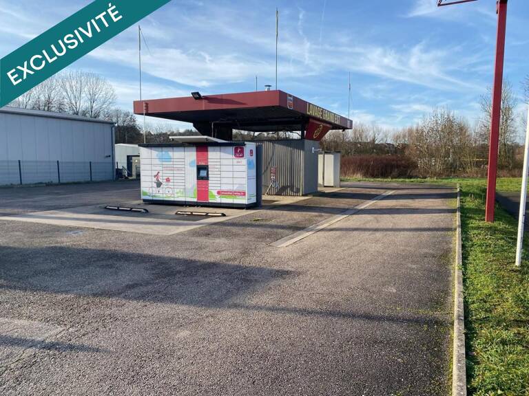 terrain industriel d'une surface de 2274 m2 sur lequel est pose une station de lavage , environ 1000 m2 est utilisé — photo 1