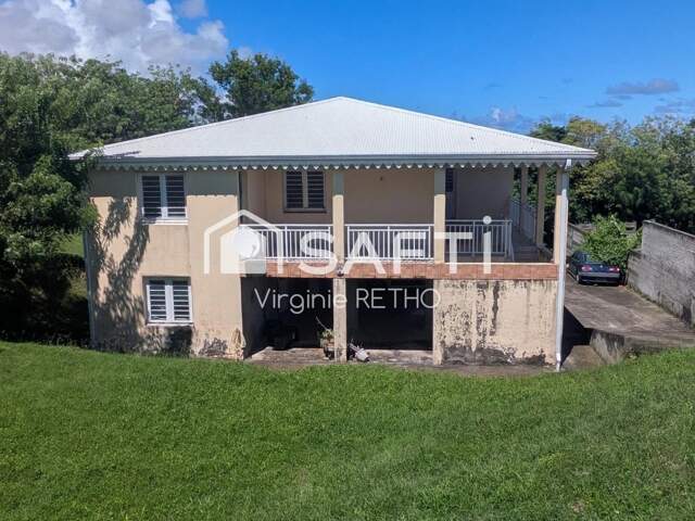 Maison 5 chambres sur 2 niveaux — photo du bien