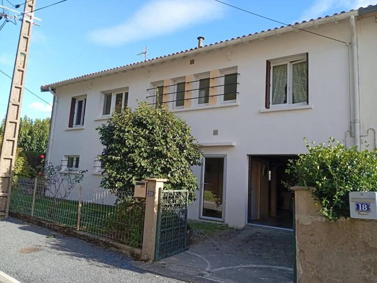 Maison mitoyenne de 85m² avec jardin et sous-sol — photo 1