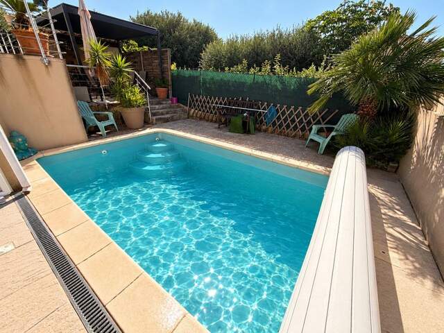 Maison T4 de 235 m² avec piscine, véranda et garage / Chateau — photo du bien