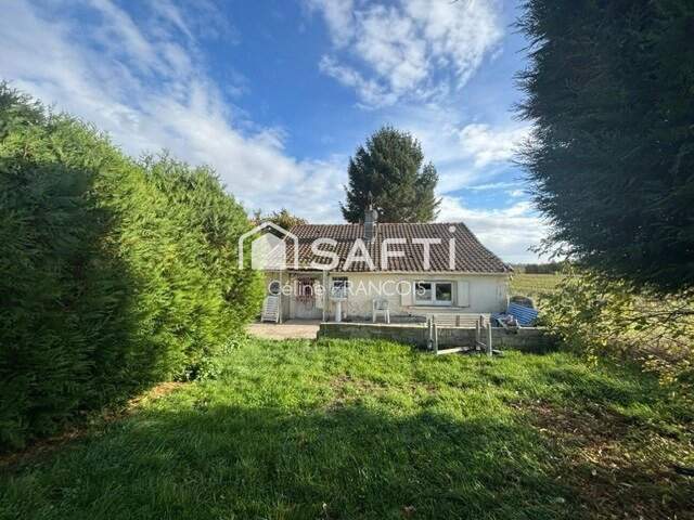 Maison en brique de plain-pied avec jardin au calme — photo du bien