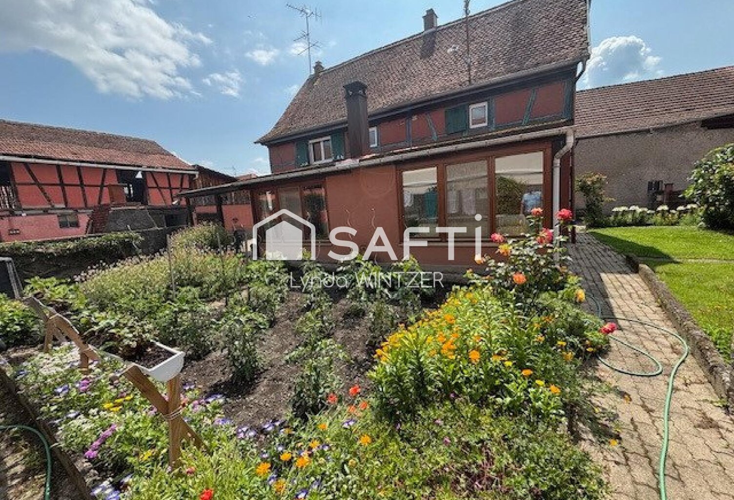 OSTHOUSE à 2 min d'ERSTEIN : Belle maison Alsacienne de 190m2 avec dépendances sur 7,4 ares de terrain clôt, piscinable et constructible. — photo 1