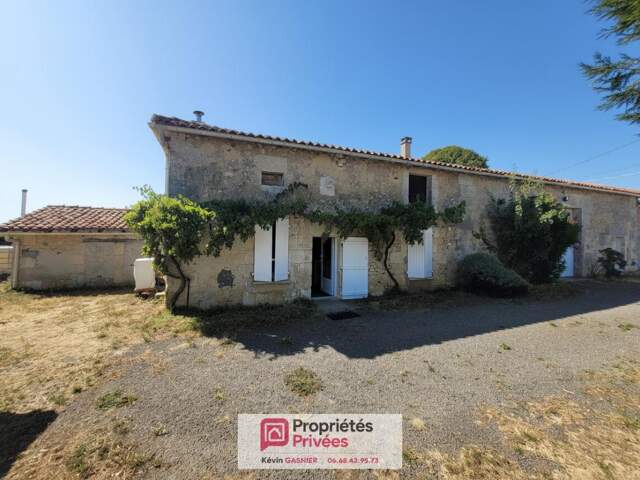 DIGNAC (16410) : Maison en pierre de 76m2 avec grange et atelier — photo du bien