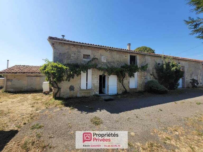 DIGNAC (16410) : Maison en pierre de 76m2 avec grange et atelier — photo 1