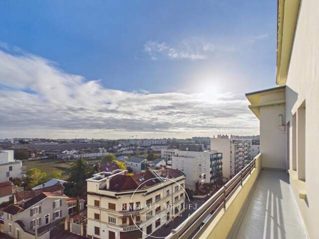 LYON 8 – 95 m² AU DERNIER ÉTAGE, BALCON ET CAVE — photo du bien