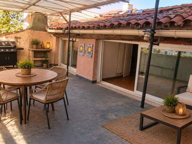 Duplex, palais omnisport, terrasse 22m², spacieuse pièce de vie, 13010 Marseille — photo du bien