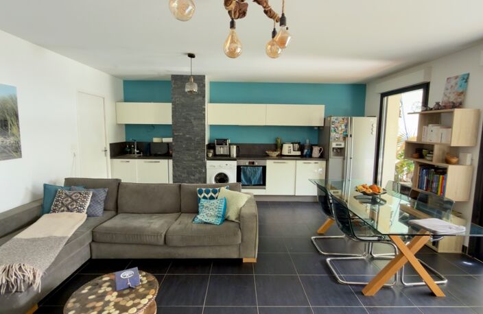 Port Marianne – T3 traversant 76 m² – Terrasse Sud 27 m² – DPE A – Parking — photo 3