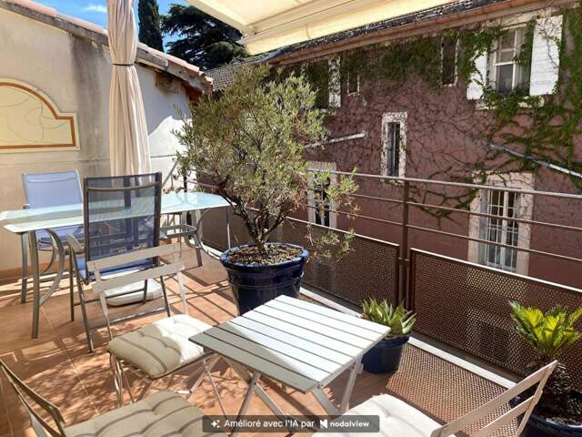 SAINT-RÉMY-DE-PROVENCE -  APPARTEMENT T3 DE 113 M² AVEC TERRASSE, GARAGE FERMÉ ET PARKING — photo du bien