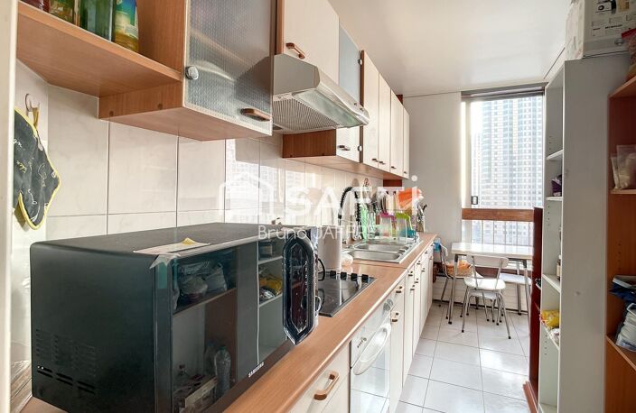 Paris 15e BEAUGRENELLE, étage élevé, 3 pièces 77m2 Vue et luminosité — photo 3