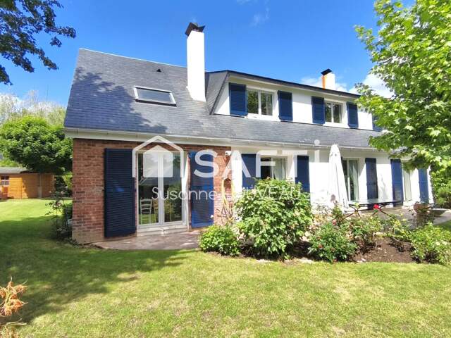 Une maison pensée pour la vie de famille, dans une résidence dédiée aux enfants — photo du bien