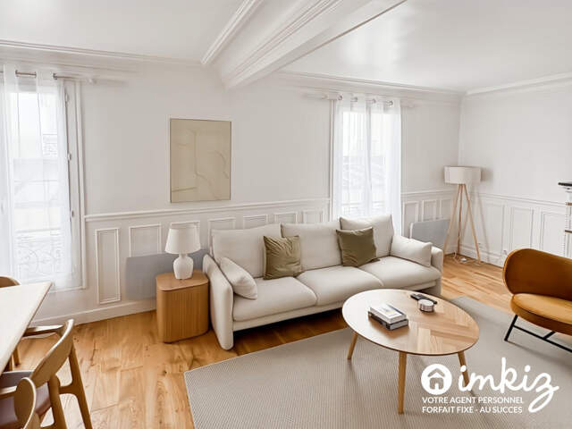Paris 9e - 51 m² de caractère, parquet et cheminée — photo du bien
