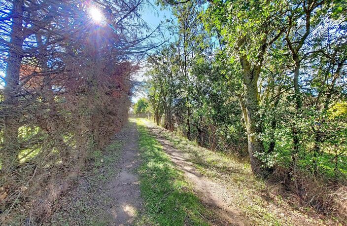 Terrain de loisirs de 1650 m² avec batiment cadastré de 22m² et puits — photo 2